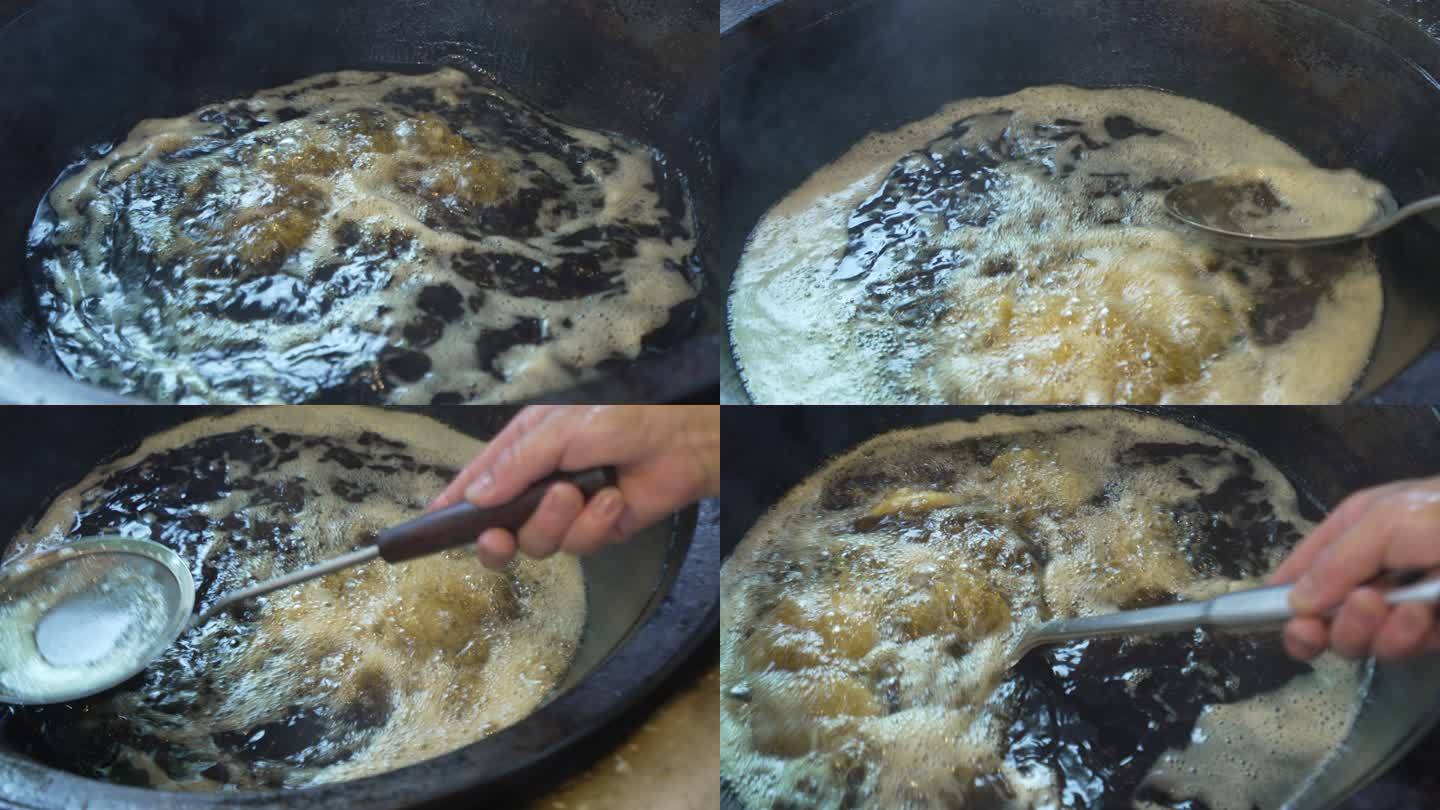 厨师油锅炸油条