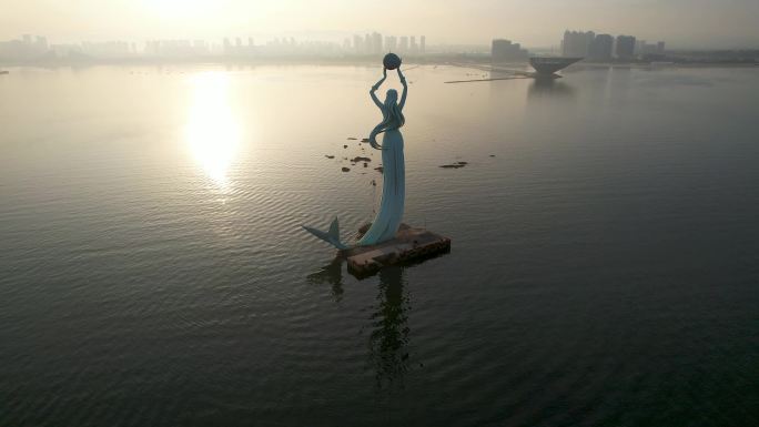 鲅鱼圈日出朝霞山海广场鲅鱼公主雕塑航拍