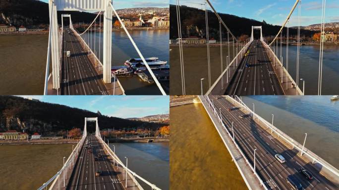 在晴朗的日子里，匈牙利多瑙河上伊丽莎白桥上行驶的车辆的无人机镜头