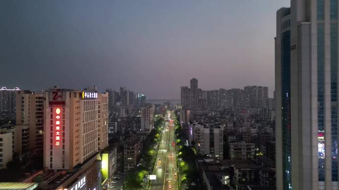 航拍广东湛江霞山区湛江国贸大厦夜景