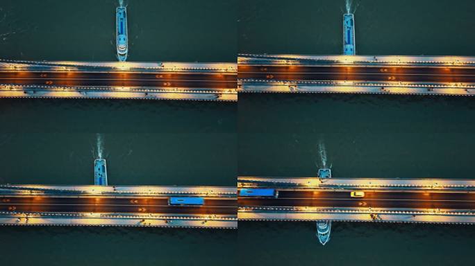 在慢动作无人机拍摄的轮渡通过在照亮sz<s:1> chenyi链桥在匈牙利布达佩斯