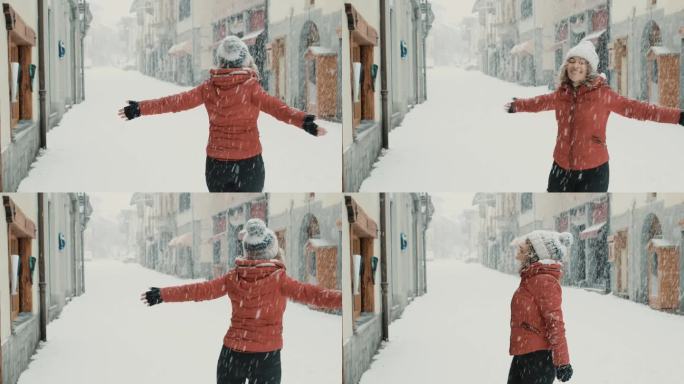 快乐的游客享受着寒假的慢动作舞蹈。并在雪下快乐转雪乡山景区旅游目的地。兴奋的女人们下了雪。户外自由