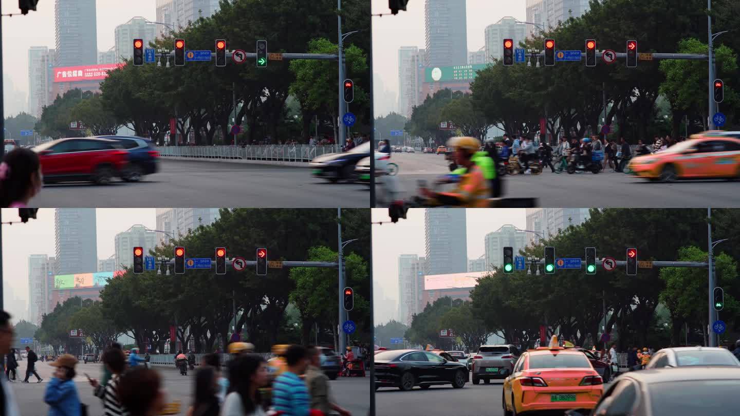 广州十字路口红绿灯车流行人过马路