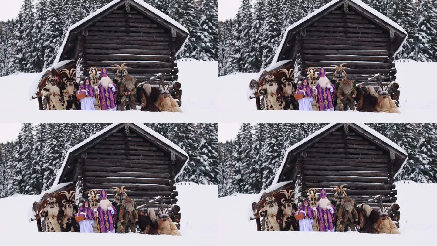 一群传说中的圣诞民间人物——圣尼古拉斯、天使和抽筋——站在一间木屋附近，背景是奥地利一座山上的云杉林