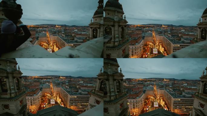 从匈牙利布达佩斯圣斯蒂芬大教堂顶上看圣诞市场和城市景观