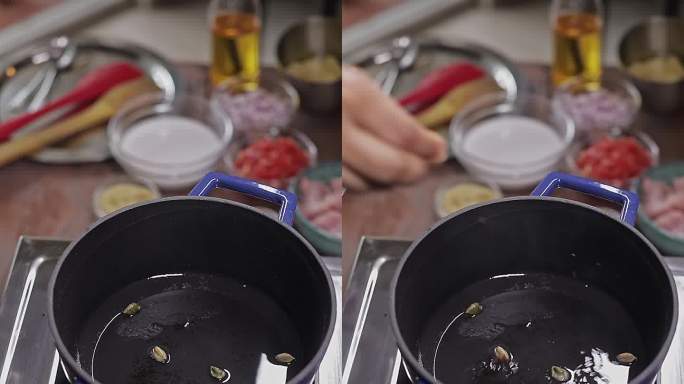 小豆蔻、丁香、肉桂等香草的特写镜头，在炊具里加入热油