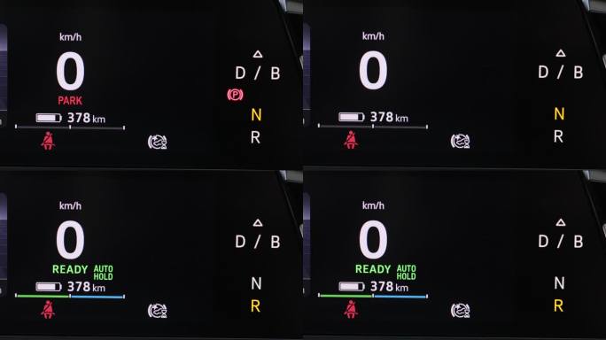 自动变速器电动汽车在倒车(R)模式在仪表板上。驾驶员的手将变速杆移动到电动汽车自动变速器的倒档(R)