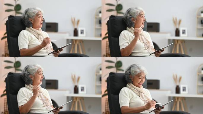 多利拍的是一个成熟的女人在看社交媒体或在平板电脑上看新闻。退休生活理念。