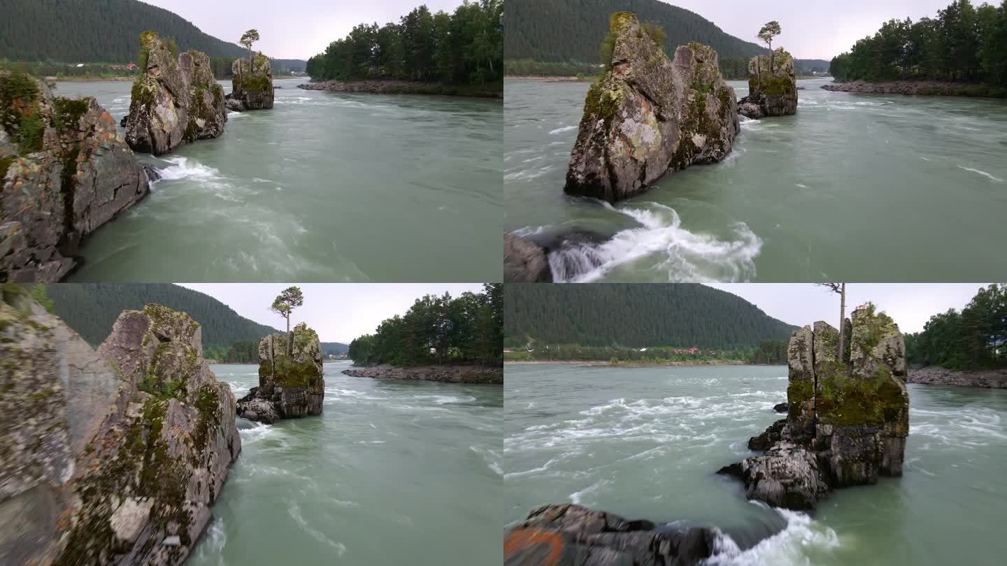 山间河流湍急的水流水里的石头。