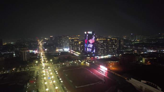 警察节亮灯人民警察楼体城市夜景