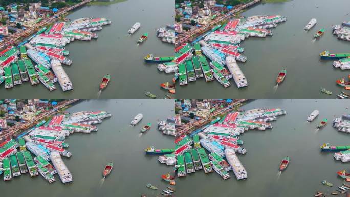 多艘渡轮停靠在繁忙的城市河岸码头。空中