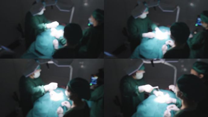 在医院黑暗的手术室里，护士在给病人缝合伤口时将手术工具递给外科医生的模糊动作。