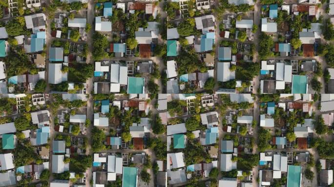 空中拍摄的村庄景观和树木密集的社区。马尔代夫