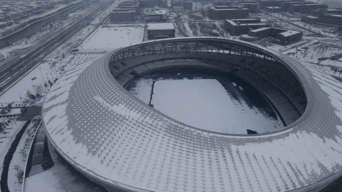 高清航拍拍摄河北体育中心雪景