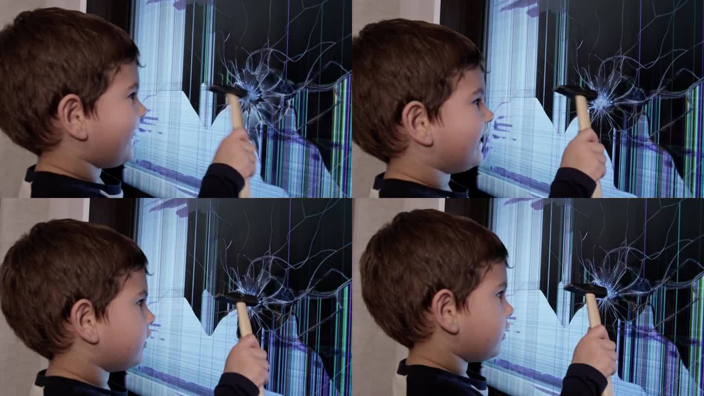 一个好奇的小男孩用坚定的表情修理坏了的屏幕