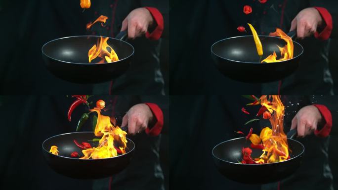 厨师用掉落的辣椒煎炸的超级慢镜头。