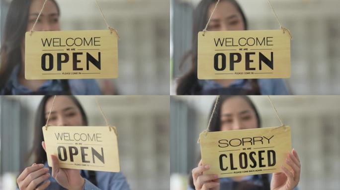 老板亚洲女人转身对不起玻璃门上的关闭标志商店