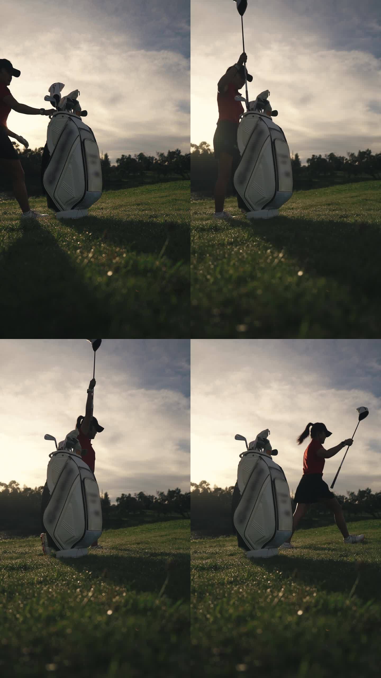 日落时分，一名中国女高尔夫球手在高尔夫球场拿起高尔夫球袋中的球杆