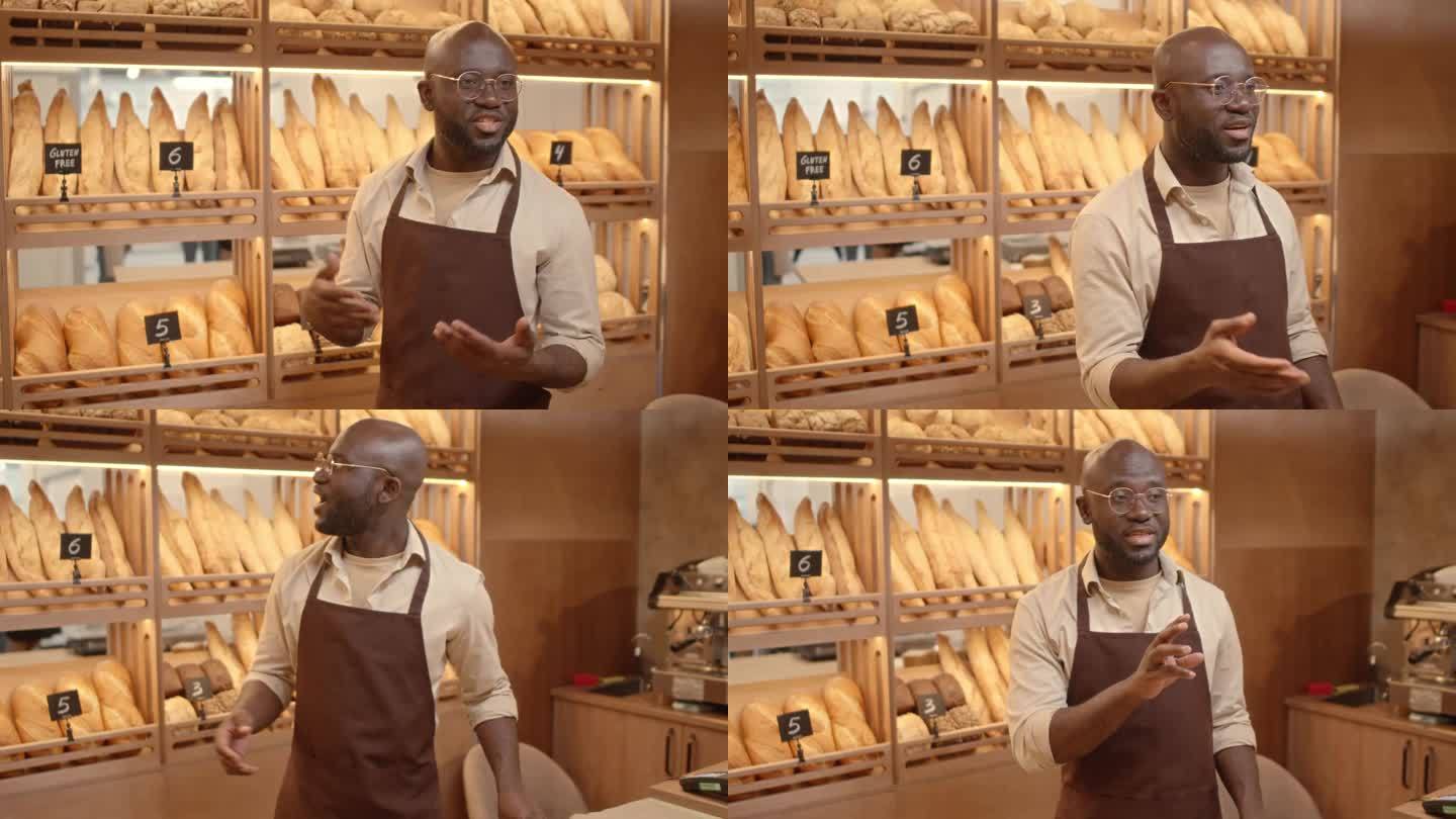 在面包店卖面包的黑人