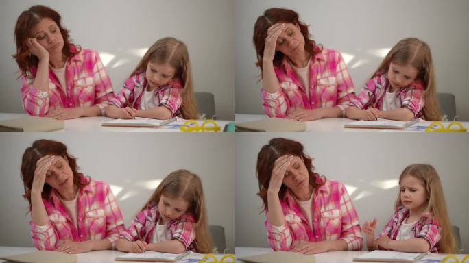 疲惫的母亲和疲惫的女儿坐在家里的桌子旁做作业。不知所措的白人妇女和不满意的女孩学习说话摇摇头，用手遮