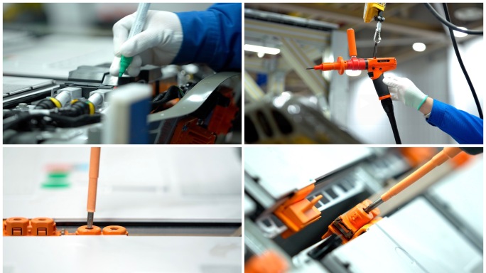 汽车工厂生产组装电池组工人拧螺丝