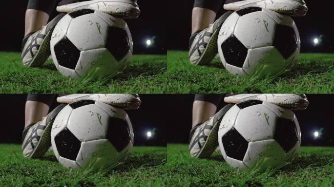 晚上踢足球的女人踩球视频素材