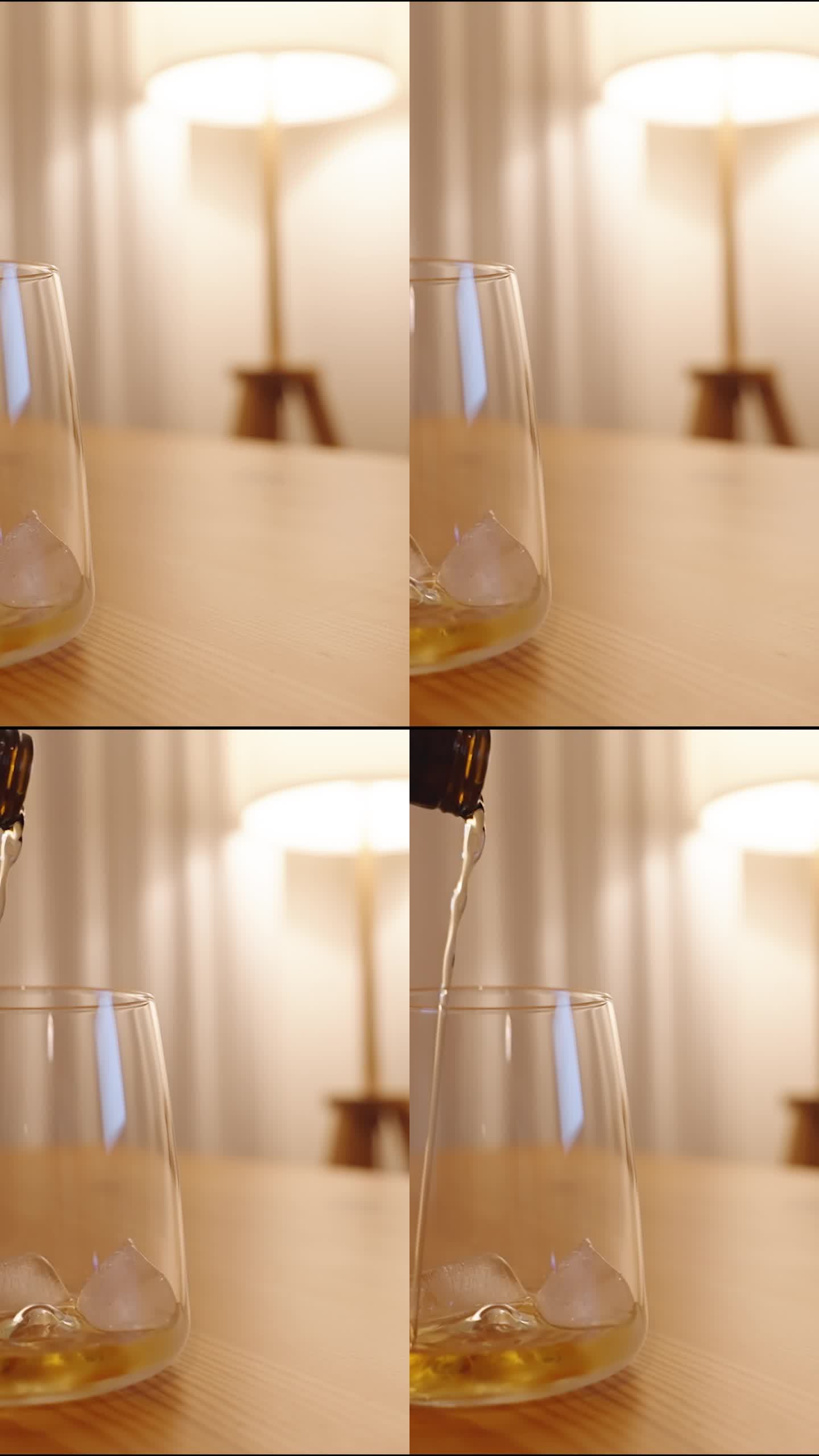 垂直视频。威士忌从黑瓶子倒进加冰的玻璃杯里。温暖柔和的灯光。缓慢的运动。