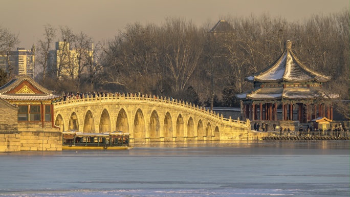 北京颐和园十七孔桥雪后黄昏延时摄影