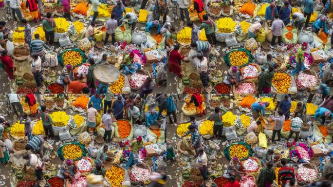 人们在印度西孟加拉邦加尔各答充满活力的Mullick Ghat花卉市场买卖鲜花的延时照片