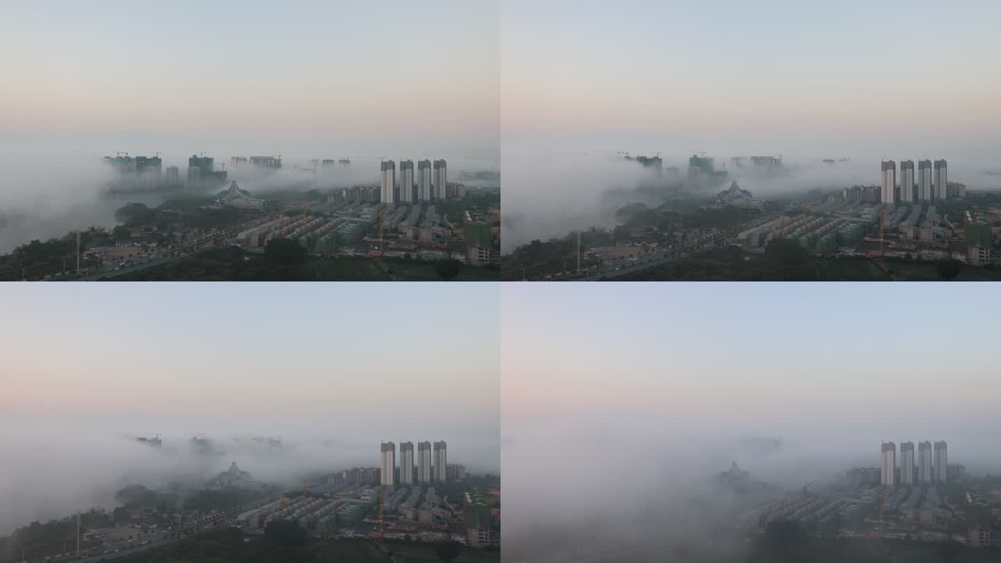 被平流雾逐渐淹没的瑞丽市高楼