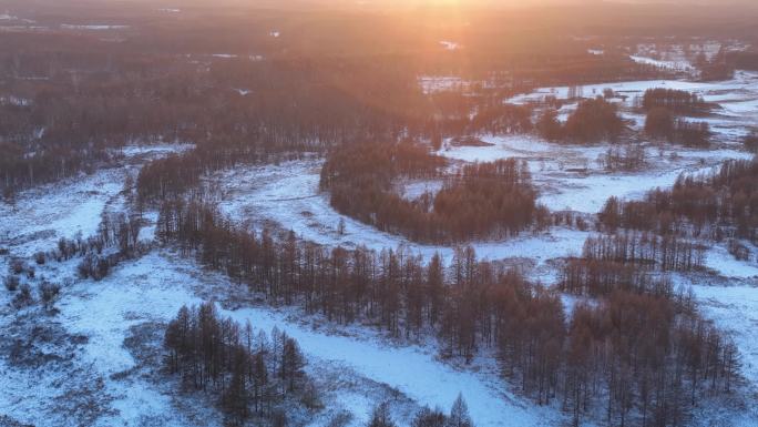 航拍大兴安岭寒冬森林河湾暮雪