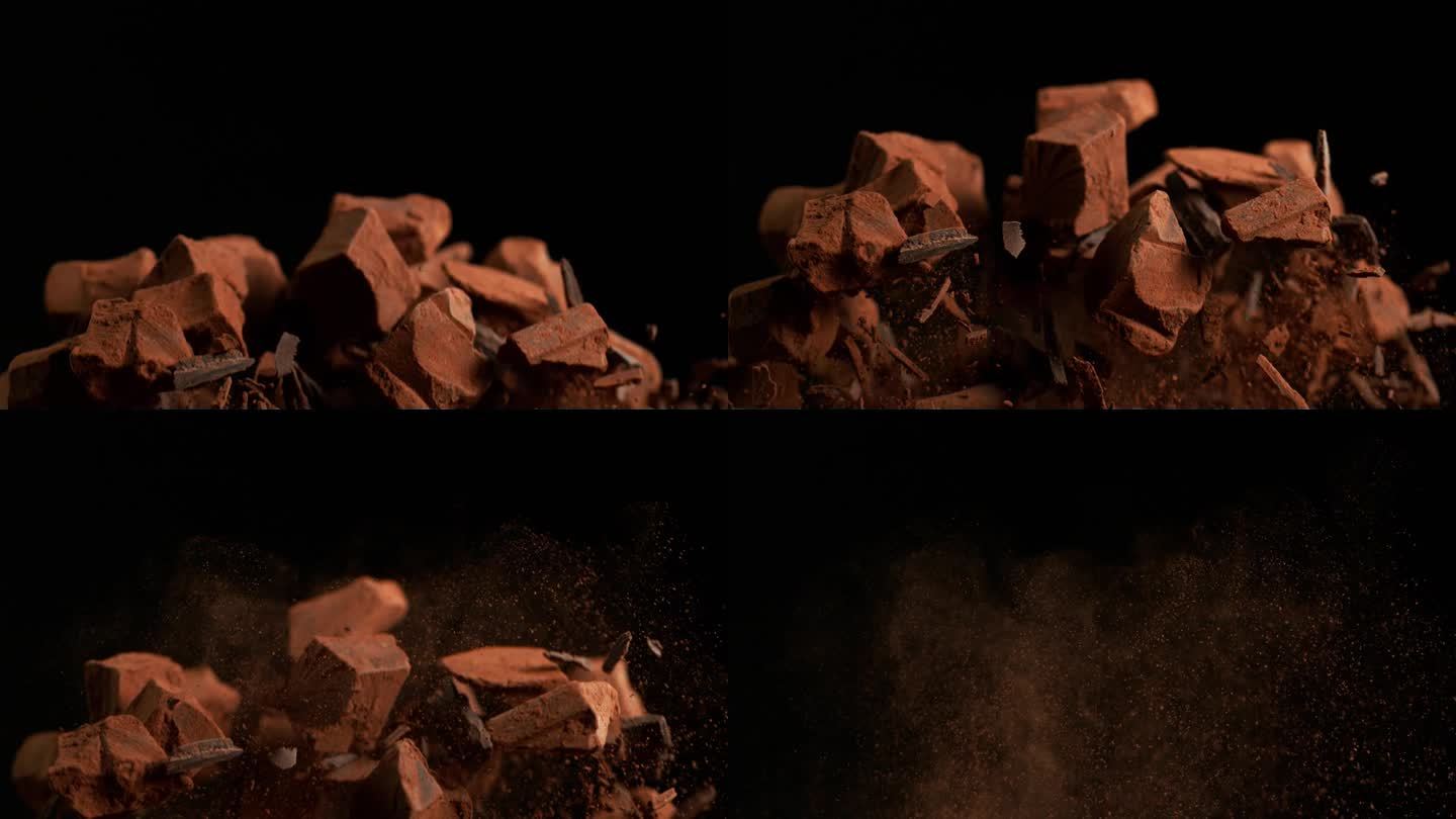 超级慢动作飞行组的生巧克力块在黑色背景。