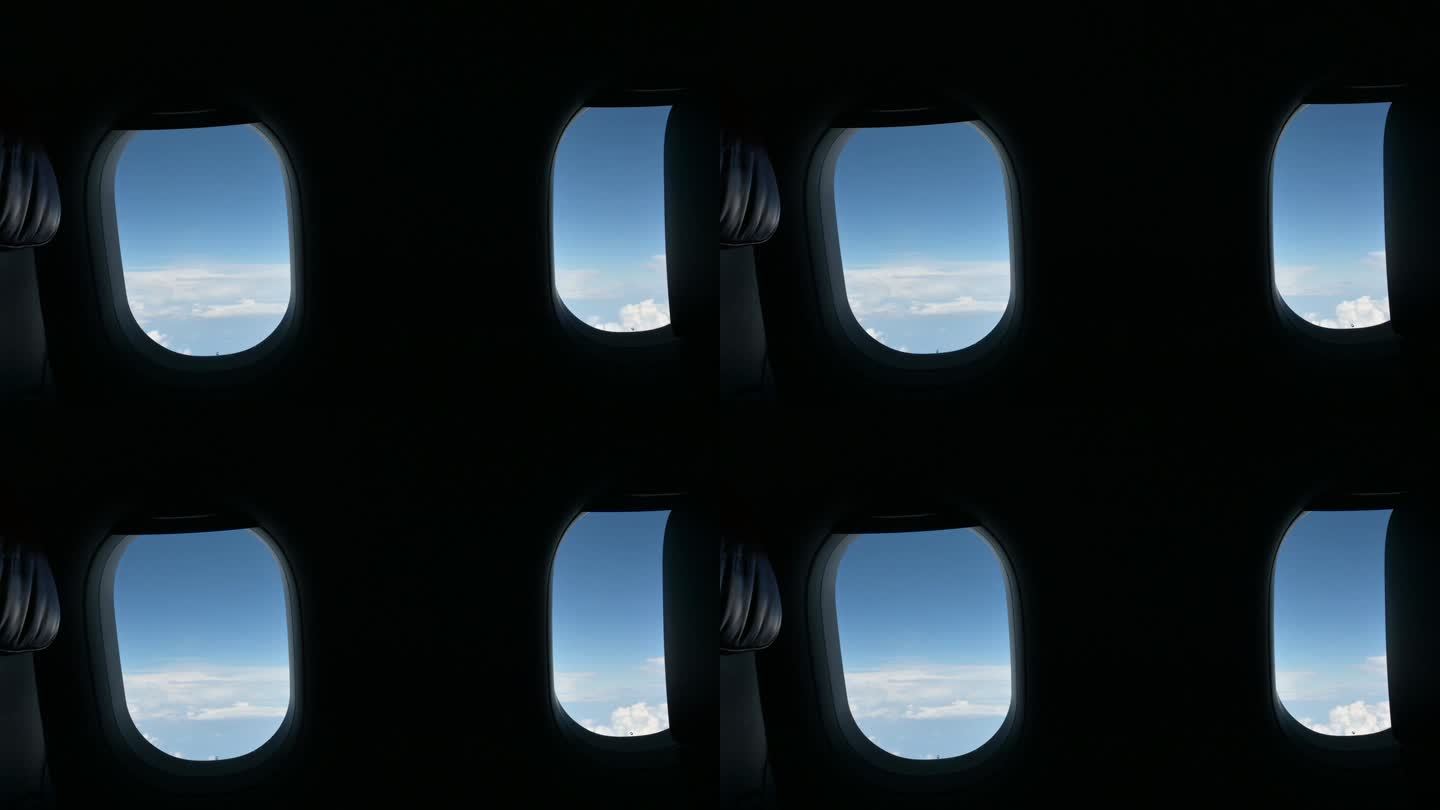 飞机飞行飞行旅行旅行在晴朗的蓝天和美丽的云，看窗外的景色