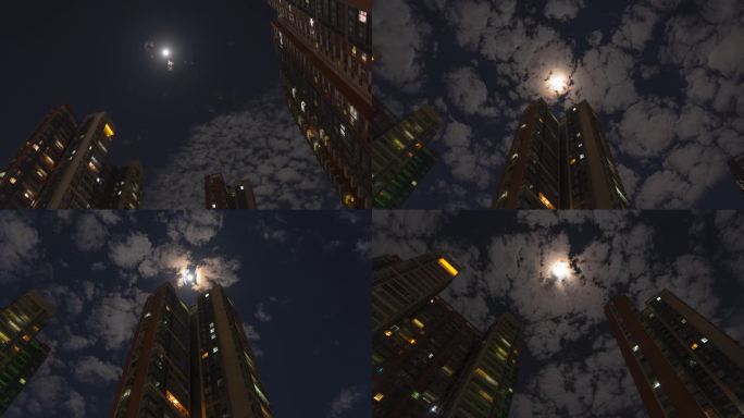 夜晚月光下的住宅楼延时摄影