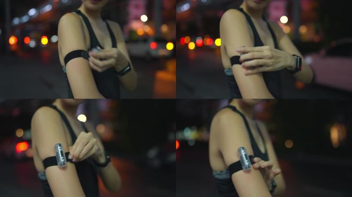 健康女性下班后喜欢夜间街头跑步。
