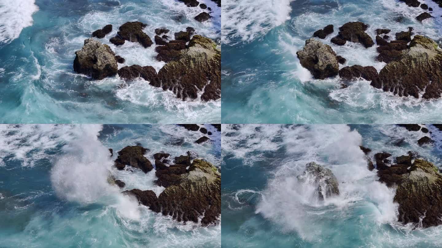 航拍印尼巴厘岛情人崖海浪拍打礁石的慢动作