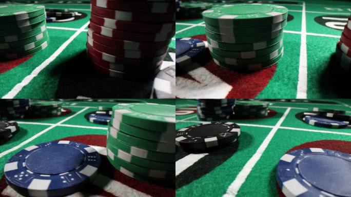 彩色扑克筹码与数字在赌场绿色投注桌上