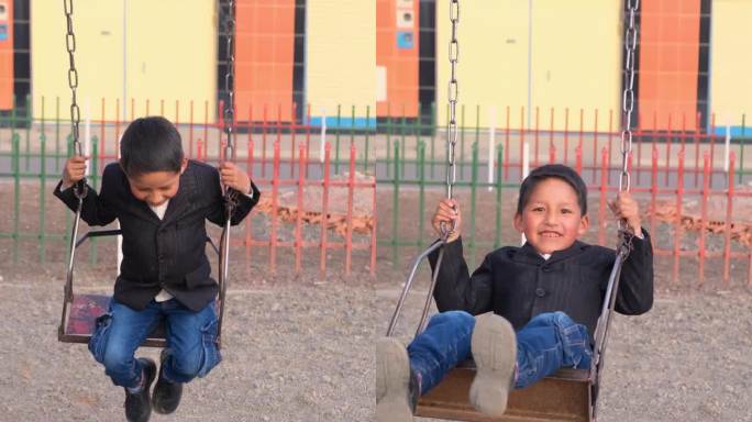 在拉丁美洲的玻利维亚拉巴斯，一个快乐的拉丁小孩在公园秋千上玩耍