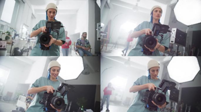 慢镜头的女电影摄影师工作在一个拍摄集，使用数码相机拍摄高质量的镜头为电影项目。有创意的女人操作照相机
