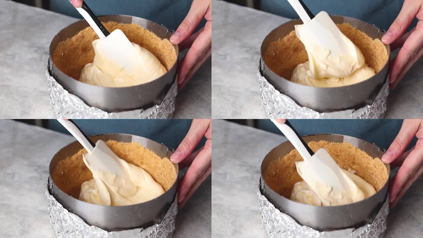 女性双手制作起司蛋糕，她把起司蛋糕放进模具视频慢动作镜头