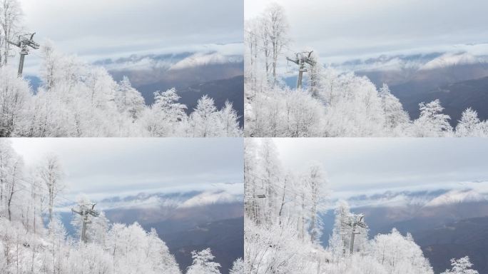 从滑雪场滑雪缆车的移动小屋看到的美丽景色。令人难以置信的山景和被霜覆盖的树木。