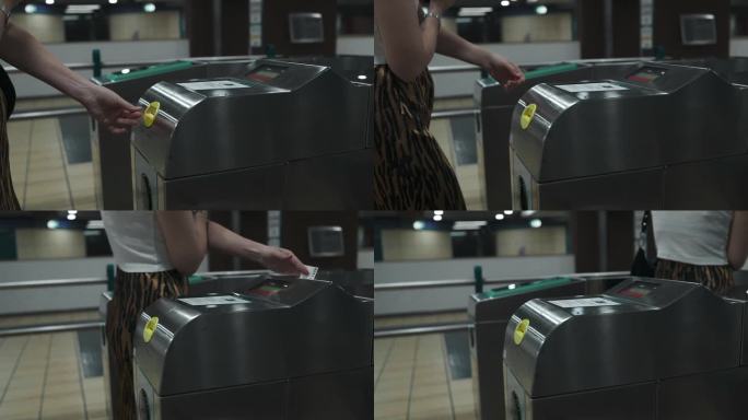 无法辨认的女性用手扫描地铁票。运输的概念