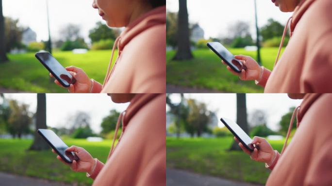 在公园散步时用智能手机近距离拍摄