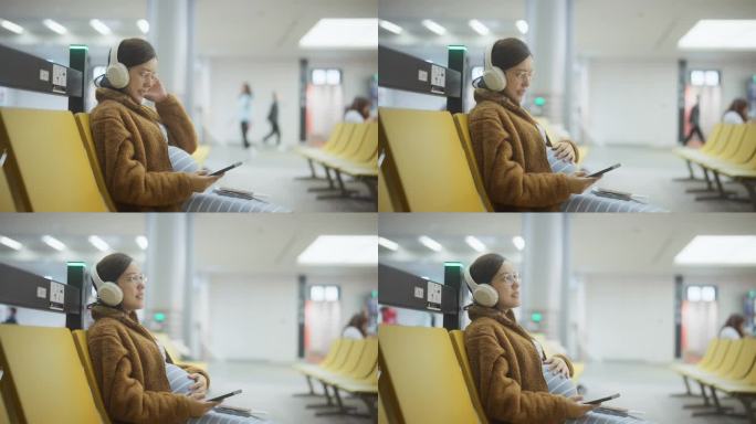 一位孕妇在机场耐心地等待她的航班