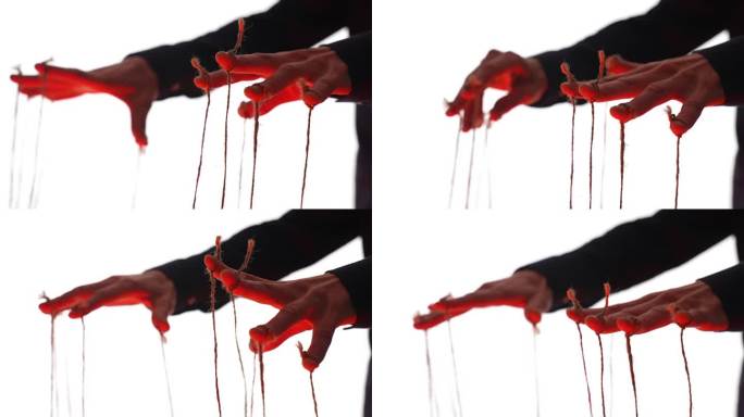 操纵手，手指上系着绳子。白色背景