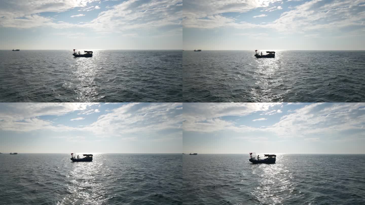 渔民出海捕鱼收网海上波光粼粼一叶扁舟渔船
