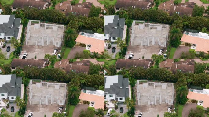 无人机拍摄的建造私人住宅的画面。佛罗里达房屋建筑工地的元素。自顶向下射击