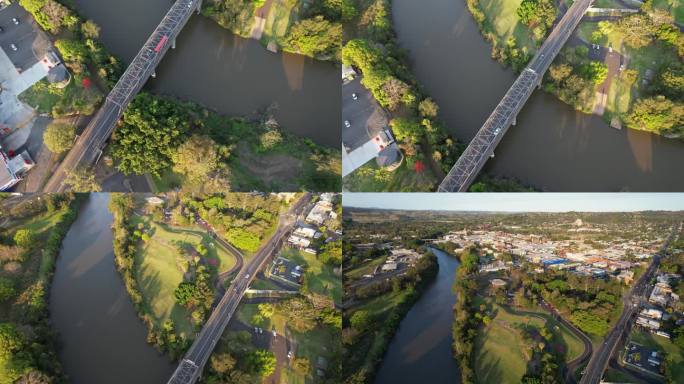 在澳大利亚新南威尔士州利斯莫尔的贝利纳街大桥上行驶的车辆穿过威尔逊河。空中倾斜拍摄