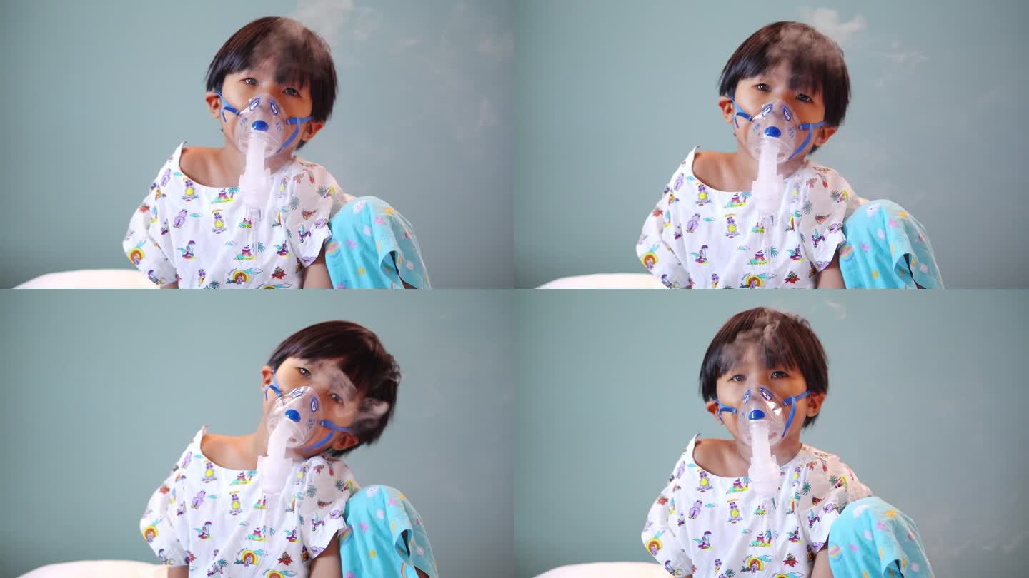 亚洲男孩坐在医院病床上，用吸入器治疗肺病。