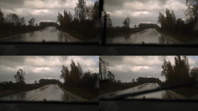暴雨期间的极限驾驶。有选择性的重点。汽车挡风玻璃的视角。危险的湿沥青公路旅行。糟糕的能见度。移动挡风
